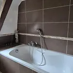 Maison De Tuiles Au Pieds Du Château De Castelnau Hébergement de vacances Prudhomat